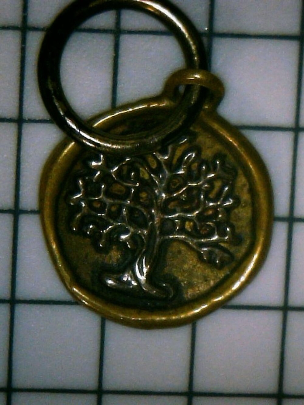 Waxing poetic tree of life charm